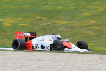 World © Octane Photographic Ltd. Sunday 21st June 2015. F1 Legends Parade – Red Bull Ring, Spielberg, Austria. 1985 Marlboro McLaren MP4-2B - Alain Prost. Digital Ref. : 1321CB7D7496