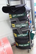 World © Octane Photographic 2010. 2010 Classic Lotus Festival, Snetterton. June 20th 2010. Lotus F1 garage - Lotus T124. Digital Ref : 0028CB5D3574