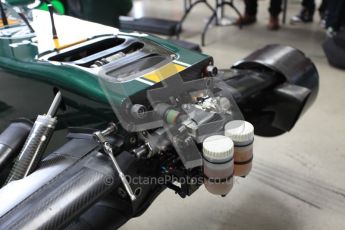 World © Octane Photographic 2010. 2010 Classic Lotus Festival, Snetterton. June 20th 2010. Lotus F1 garage - Lotus T124. Digital Ref : 0028CB5D3583