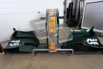 World © Octane Photographic 2010. 2010 Classic Lotus Festival, Snetterton. June 20th 2010. Lotus F1 garage - Lotus T124. Digital Ref : 0028CB5D3585