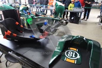 World © Octane Photographic 2010. 2010 Classic Lotus Festival, Snetterton. June 20th 2010. Lotus F1 garage - Lotus T124. Digital Ref : 0028CB5D3573