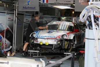 2010 Le Mans 24 Hour (24 Heures du Mans), 11th June 2010. IMSA Performance - Porsche 997 GT3 RSR garage. Digital ref : CB1D2007