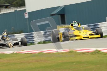 World © Octane Photographic 2010. 2010 Donington Revived! meeting, September 4th 2010. MastersGP - Historic Formula 1, Historic F1. Fitipaldi F5a - Richard Barber, Lotus 91 - Dan Collins. Digital ref : 0029CB1D3352