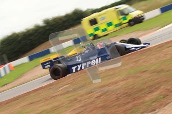 World © Octane Photographic 2010. 2010 Donington Revived! meeting, September 4th 2010. MastersGP - Historic Formula 1, Historic F1. Tyrrell 009 - Bill Coombs, Fitipaldi F5a Richard Barber. Digital ref : 0029CB7D5881