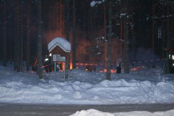 © North One Sport Ltd.2010 / Octane Photographic Ltd.2010. WRC Sweden SS15. February 13th 2010, Fans keeping warm by their open fires in the woodland. Digital Ref : 0135CB1D2226