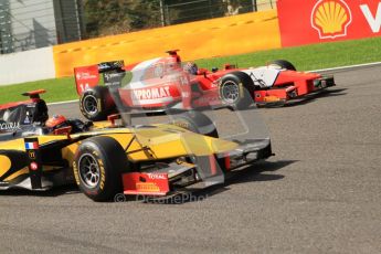 © Octane Photographic Ltd. 2011. Belgian Formula 1 GP, GP2 Race 2 - Sunday 28th August 2011. Romain Grosjean of DAMS taking a tighter racing line than Josef Krai of Arden International into La Source. Digital Ref : 0205cb7d0379