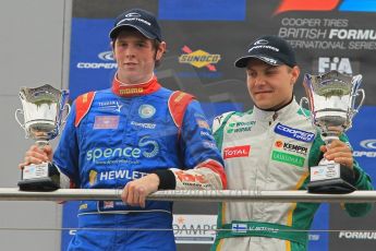 © Octane Photographic 2011 – British Formula 3 - Donington Park - Race 2. 25th September 2011, William Buller and Valtteri Bottas on the podium. Digital Ref : 0186lw1d7263