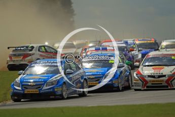 © Octane Photographic Ltd. 2011. British Touring Car Championship – Snetterton 300, Jason Plato - Chevrolet Cruze - leads the field though the flying dust of a spinning Matt Neal. Sunday 7th August 2011. Digital Ref : 0124CB1D4166