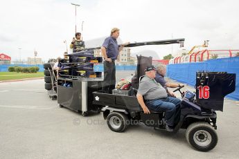 © Octane Photographic Ltd. 2011. European Formula1 GP, Friday 24th June 2011. GP2 Practice. Fairuz Fauzy hitches a lift on the Super Nova Racing mobile garage. Digital Ref: 0082CB1D6176
