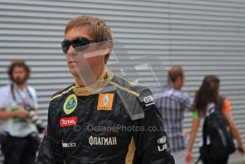 © Octane Photographic Ltd. 2011. European Formula1 GP, Friday 24th June 2011. Formula 1 paddock. Vitaly Petrov - Lotus Renault GP Digital Ref: 0086LW7D5975