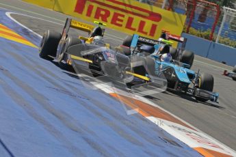 © Octane Photographic Ltd. 2011. European Formula1 GP, Sunday 26th June 2011. GP2 Sunday race. Adam Carroll - Super Nova battling with Johnny Cecotto - Ocean Racing Technology. Digital Ref:  0090CB1D9325