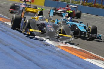© Octane Photographic Ltd. 2011. European Formula1 GP, Sunday 26th June 2011. GP2 Sunday race. Adam Carroll - Super Nova battling with Johnny Cecotto - Ocean Racing Technology. Digital Ref:  0090CB1D9327