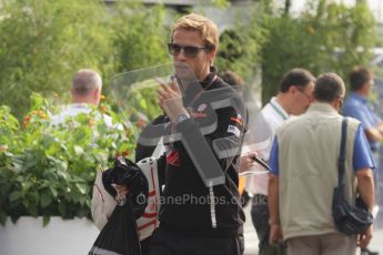 © Octane Photographic Ltd. 2011. Formula 1 World Championship – Italy – Monza – 11th September 2011. Race Day in the Paddock. Jenson Button walking into the paddock before the race. Digital Ref : 0193LW7D6600