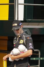 © Octane Photographic Ltd. 2011. Formula 1 World Championship – Italy – Monza – 11th September 2011. Bruno Senna with teddies a fan gave him. Digital Ref : 0193LW7D7201