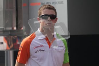 © Octane Photographic Ltd. 2011. Formula 1 World Championship – Italy – Monza – 11th September 2011. Race Day in the Paddock. Paul Di Resta walking past McLaren after the driver's parade. Digital Ref : 0193LW7D7233