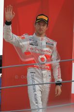 © Octane Photographic Ltd. 2011. Formula 1 World Championship – Italy – Monza – 11th September 2011 – Podium – Jenson Button (McLaren) walks onto the podium. Digital Ref :  0178CB1D4132