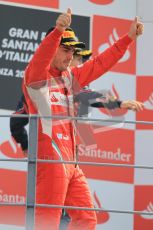 © Octane Photographic Ltd. 2011. Formula 1 World Championship – Italy – Monza – 11th September 2011 – Podium – Fernando Alonso (Ferrari) salutes teh loyal Tifossi. Digital Ref : 0178CB1D4134