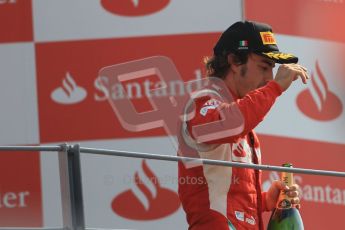© Octane Photographic Ltd. 2011. Formula 1 World Championship – Italy – Monza – 11th September 2011 – Podium – Fernando Alonso (Ferrari) salutes the loyal Tiffosi. Digital Ref :  0178CB1D4261