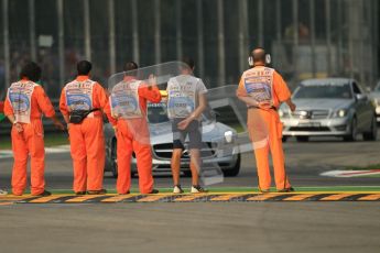 © Octane Photographic Ltd. 2011. Formula 1 World Championship – Italy – Monza – 10th September 2011 – pre-session marshall inspection. Free practice 3 – Digital Ref : 0175CB1D2449