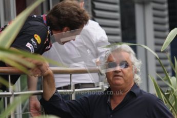 © Octane Photographic Ltd. 2011. Formula 1 World Championship – Italy – Monza – 10th September 2011, Flavio Briatore shakes hands with Christian Horner of Red Bull Racing – Free practice 3 – Digital Ref : 0175LW7D5887
