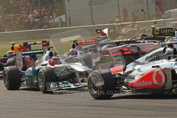 © Octane Photographic Ltd. 2011. Formula 1 World Championship – Italy – Monza – 11th September 2011 – Wings and carbon fibre fly as Nico Rosberg (Mecedes) and Vitaly Petrov (Renault) are hit by Viantonio Liutzi (HRT) – Race – Digital Ref : 0177CB7D7851