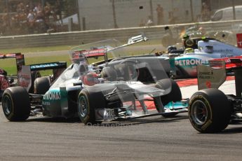© Octane Photographic Ltd. 2011. Formula 1 World Championship – Italy – Monza – 11th September 2011 Wings and carbon fibre fly as Nico Rosberg (Mecedes) and Vitaly Petrov (Renault) are hit by Viantonio Liutzi (HRT) – Race – Digital Ref : 0177CB7D7852