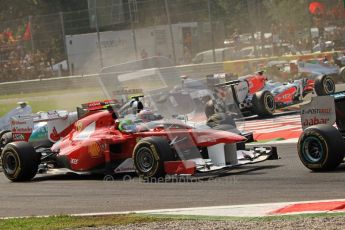 © Octane Photographic Ltd. 2011. Formula 1 World Championship – Italy – Monza – 11th September 2011 Viantinio Liutzi (HRT hits Vitaly Petrov (Renault) and Nico Rosberg (Mercedes) as Felipe Massa (Ferrari) escapes – Race – Digital Ref : 0177CB7D7855