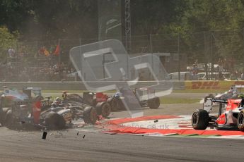 © Octane Photographic Ltd. 2011. Formula 1 World Championship – Italy – Monza – 11th September 2011 - Debris showers the track after the accident caused by Viantonio Liutzi (HRT) takes out Nico rosberg (Mercedes) and Vitaly Petrov (Renault) – Race – Digital Ref : 0177CB7D7865