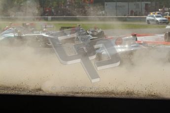© Octane Photographic Ltd. 2011. Formula 1 World Championship – Italy – Monza – 11th September 2011 Dust flys as the pack avoids the 1st corner accident – Race – Digital Ref :  0177CB7D7880