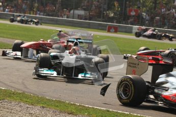 © Octane Photographic Ltd. 2011. Formula 1 World Championship – Italy – Monza – 11th September 2011 Debris is flicked up from the back of Lewis Hamilton;s McLaren as the safety car leads the pack around – Race – Digital Ref : 0177CB7D7932