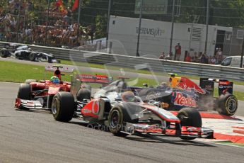 © Octane Photographic Ltd. 2011. Formula 1 World Championship – Italy – Monza – 11th September 2011 Mark webber mounts the curb in the 1st chicane trying to close in on Felipe Massa's Ferrari – Race – Digital Ref : 0177CB7D7978