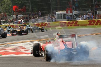 © Octane Photographic Ltd. 2011. Formula 1 World Championship – Italy – Monza – 11th September 2011 Felipe Massa spins up his rear wheel to point his Ferrari in the right direction after heavy contact by Mark Webber's Red Bull – Race – Digital Ref : 0177CB7D7993