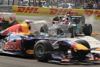 © Octane Photographic Ltd. 2011. Formula 1 World Championship – Italy – Monza – 11th September 2011 - Sebastian Vettel (Red Bull) leads Fernando Alonso's Ferrari whilst Michael Schumacher (Mercedes) runs wide whilst trying to keep back Lewis Hamilton in his McLaren – Race – Digital Ref : 0177CB7D8017B