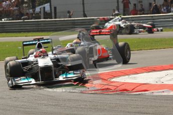 © Octane Photographic Ltd. 2011. Formula 1 World Championship – Italy – Monza – 11th September 2011 Lewis Hamilton in his McLaren closes down on Michael Schumacher's Mercedes – Race – Digital Ref : 0177CB7D8055