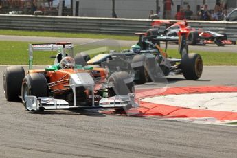 © Octane Photographic Ltd. 2011. Formula 1 World Championship – Italy – Monza – 11th September 2011 Adrian Sutil (Force India) and Heikki Kovalainen (Team Lotus) – Race – Digital Ref :  0177CB7D8067