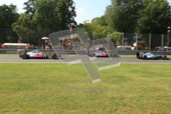 © Octane Photographic Ltd. 2011. Formula 1 World Championship – Italy – Monza – 11th September 2011 – Race – The brakes of Lewis Hamilton glow as he as fellow McLaren team mate Jenson Button queue behind a difficult Michael Schumacher in his Mercedes. Digital Ref : 0177CB7D8150