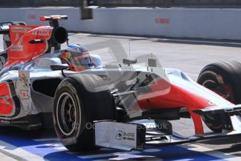 © Octane Photographic Ltd. 2011. Formula 1 World Championship – Italy – Monza – 11th September 2011 Daniel Ricciardo checks his mirrors after exiting his HRT pit box after a tyre change – Race – Digital Ref : 0177CB7D8184
