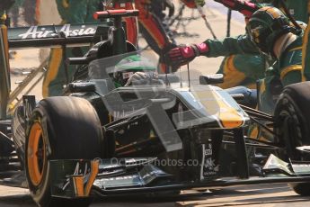 © Octane Photographic Ltd. 2011. Formula 1 World Championship – Italy – Monza – 11th September 2011 Heikki Kvalainen is released from his Lotus pitbox after his final pit stop– Race – Digital Ref : 0177CB7D8206