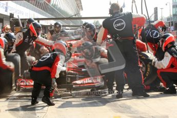 © Octane Photographic Ltd. 2011. Formula 1 World Championship – Italy – Monza – 11th September 2011 Mid-tyre change for Virgin Racing as Timo Glock makes his final pitstop – Race – Digital Ref :  0177CB7D8217