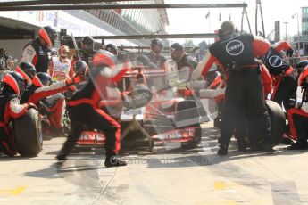 © Octane Photographic Ltd. 2011. Formula 1 World Championship – Italy – Monza – 11th September 2011 Timo Glock's Virgin Racing VMR02 is just about to be released from his pit box after his final stop for tyres – Race – Digital Ref : 0177CB7D8221