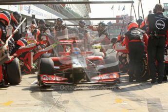 © Octane Photographic Ltd. 2011. Formula 1 World Championship – Italy – Monza – 11th September 2011 Timo Glock's Virgin Racing VMR02 is released from his pitbox to continue racing – Race – Digital Ref : 0177CB7D8223