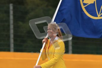 © Octane Photographic Ltd. 2011. Formula One Belgian GP – Spa – Sunday 28th August 2011 – Drivers’ parade and starting grid. The FIA flag being paraded. Digital Reference : 0167lw7d8361