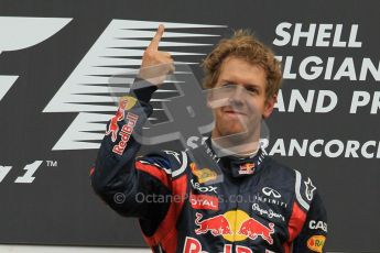 © Octane Photographic Ltd. 2011. Formula One Belgian GP – Spa – Sunday 28th August 2011 – The famous finger. Sebastian Vettel on the podium. Digital Reference : 0169CB1D