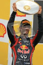 © Octane Photographic Ltd. 2011. Formula One Belgian GP – Spa – Sunday 28th August 2011 – mark webber hoists his trophy on the podium. Digital Reference : 0169cb1d1076