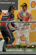 © Octane Photographic Ltd. 2011. Formula One Belgian GP – Spa – Sunday 28th August 2011 – Jenson Button and Mark webber ready to spray the Champagne on the podium. Digital Reference : 0169cb1d1096
