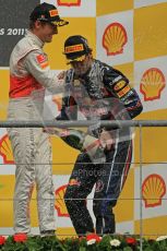 © Octane Photographic Ltd. 2011. Formula One Belgian GP – Spa – Sunday 28th August 2011 – Jenson Button and Mark Webber on the podium. Digital Reference : 0169cb1d1113
