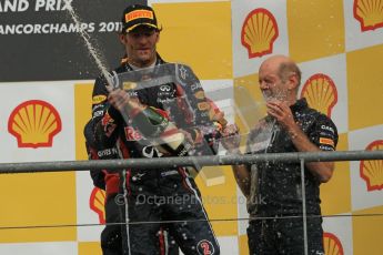 © Octane Photographic Ltd. 2011. Formula One Belgian GP – Spa – Sunday 28th August 2011 – mark Webber sprays the crowd whilst Adrian Newey gets soaked by Sebastian Vettel. Digital Reference : 0169cb1d1129