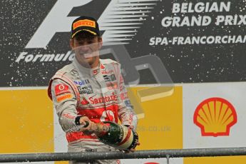 © Octane Photographic Ltd. 2011. Formula One Belgian GP – Spa – Sunday 28th August 2011 – Jenson Button celebrating on the podium. Digital Reference : 0169cb1d1130
