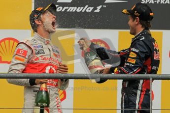 © Octane Photographic Ltd. 2011. Formula One Belgian GP – Spa – Sunday 28th August 2011 – Sebastian Vettel sprays Jenson Button on the podium. Digital Reference : 0169cb1d1146