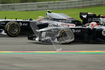 © Octane Photographic Ltd. 2011. Formula One Belgian GP – Spa – Sunday 28th August 2011 – Race. Williams battle - Pastor Maldonado overtakes Rubens Barrichello in their sister Williams FW33s. Digital Reference : 0168cb1d0453